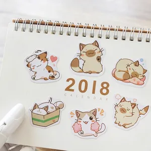 Set of 45 cute cartoon cat stickers featuring various poses on a white spiral calendar