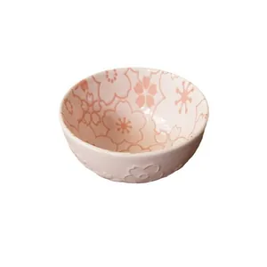 Japanese style cherry blossom ceramic rice bowl with embossed flower patterns