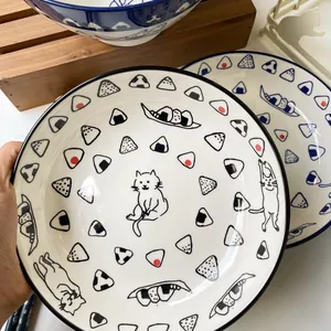 Japanese style ceramic dinnerware set with hand-painted sushi cat and onigiri illustrations