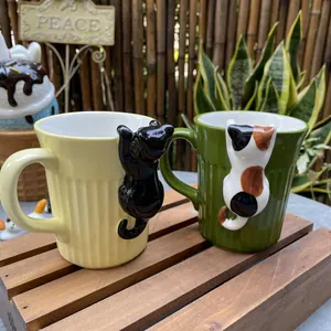Ceramic cat mug set featuring vertical stripe texture and cute 3D peeping cats on the rim