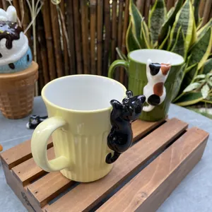 Cute ceramic cat coffee mugs with 3D kitty figurines and vertical stripe textures