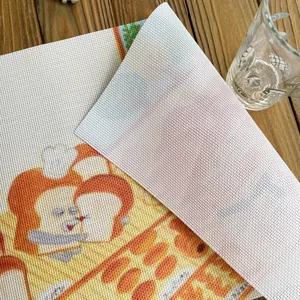 Detail of pre-printed mesh canvas for DIY rug hooking with cartoon character design