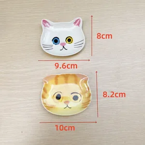 Detailed size view of two cute cat face ceramic sauce dishes with dimensions