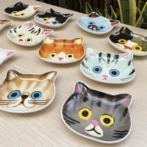 Set of creative cat-shaped ceramic seasoning dishes in various cartoon kitty patterns