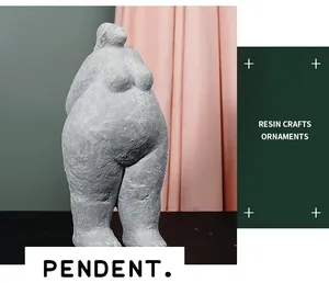 Macro view of textured grey resin yoga woman sculpture showing fine stone-like details