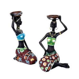 Set of two African woman resin statues with intricate tribal patterns for home decor