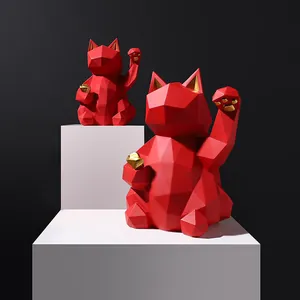 Pair of red geometric resin lucky cat figurines with gold accents for home decor