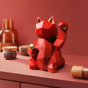 Modern geometric resin lucky cat statue in deep red and gold for home desktop decor