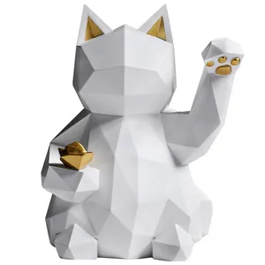 Modern geometric lucky cat figurine in matte white and gold for desktop home decor