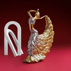 Elegant gold and silver peacock dancer resin statue for luxury home desktop decor