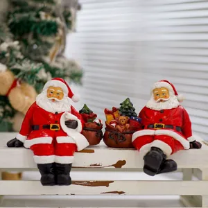 Classic Santa Claus figurines set with gifts on a vintage wooden bench for Christmas decor
