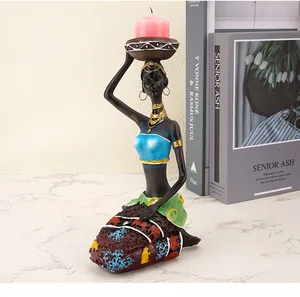 Exotische Afrikaanse vrouwenfiguur kandelaar van hars met handgeschilderde details