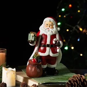 Statuetta in Resina di Babbo Natale Retro Europeo Ornamento di Natale Decorazione da Tavolo Seduto sul Camino con Ghirlanda per la Casa Regalo di Festa