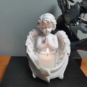 Handgemaakte vintage engel kaarsenhouder van witte hars voor noords tafeldecor