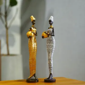 Statues de femmes africaines en résine dorée avec motifs pour décoration d'intérieur