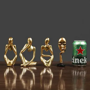 Vierteiliges Set goldener abstrakter Denker-Statuen aus Harz für die Wohndekoration