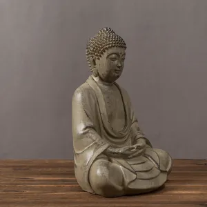 Macro detail of antique finish resin Buddha statue for Zen home and tea room decoration