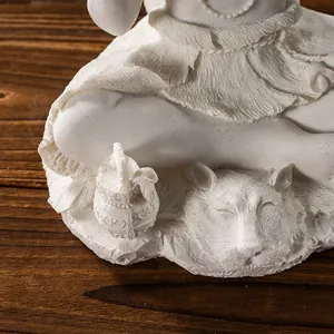 Close-up of Hindu deity Shiva resin statue showing detailed tiger base and texture