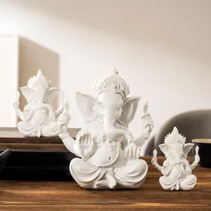 Three-piece set of white Ganesh resin statues in various sizes for home zen decor
