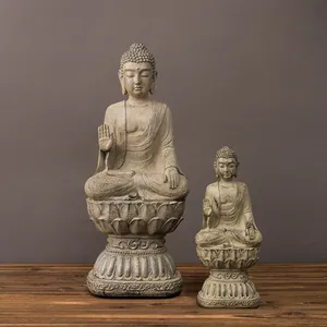 Zen Buddha statues on lotus base with sandstone texture for home meditation decor