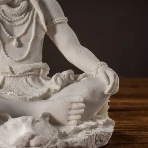 Macro detail of Lord Shiva resin statue showing intricate textures and marble-like finish