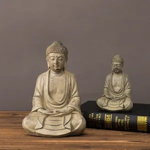 Zen Buddha statues set in aged sandstone texture for minimalist home meditation decor