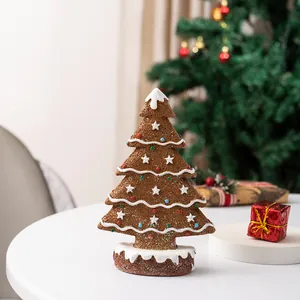 Detailed close-up of a gingerbread style resin Christmas tree with colorful candy dots