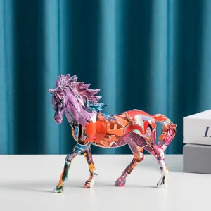 Close-up of vibrant graffiti horse statue showing artistic resin texture and colors