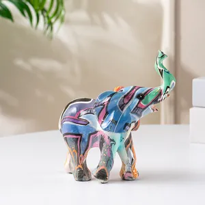 Macro detail of the colorful graffiti art texture on a resin elephant figurine sculpture