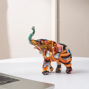 Close-up of colorful graffiti elephant resin statue with vibrant painted patterns