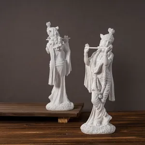 White Krishna resin statue set showing front and back views on a wooden tray