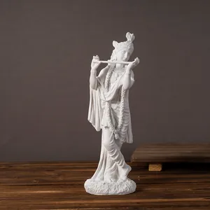 Intricate white resin Krishna statue playing flute on wood base for home decor