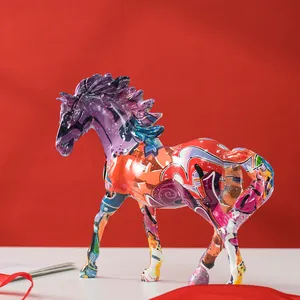 Close-up of graffiti resin horse statue with vibrant multi-color artistic patterns