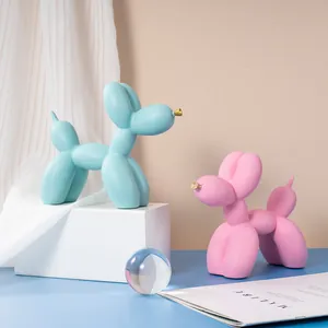 Statues de chien ballon en résine mate rose et bleue avec accents dorés pour décor