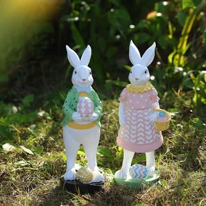 Figuras de pareja de conejos de Pascua con huevos, estatuas de resina decorativas jardín