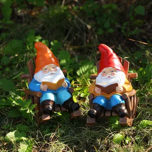 Funny garden gnomes on rocking chairs reading books outdoor lawn statue ornaments
