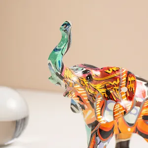 Close-up of colorful graffiti elephant resin ornament showing modern artistic detail