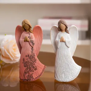 Carved angel resin figurines in prayer pose with floral relief for home decor