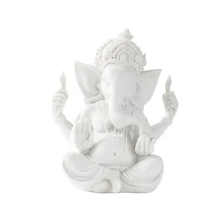 Intricate white resin Ganesha statue with four arms and Om symbol for home decor