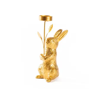 Golden rabbit candle holder with leaf texture for home decor and festive atmosphere