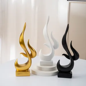 Abstract flame resin sculptures in gold black and white for modern home table decor