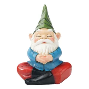 Meditating garden gnome statue in resin, sitting peacefully for outdoor or indoor decor