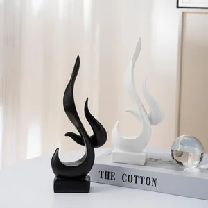 Modern abstract flame resin statues in black and white finish for minimalist home decor