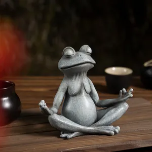 Meditating frog garden statue with stone texture finish for yoga decor and zen atmosphere