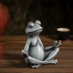 Detailed view of resin meditating frog statue with stone texture for home garden decor