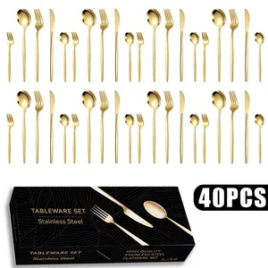 Detail of 40-piece gold stainless steel cutlery set with elegant black gift box packaging