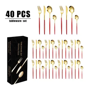 Vue détaillée du service de couverts 40 pièces en rouge et or avec boîte cadeau