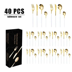 Détail du service de couverts 40 pièces en acier inoxydable or et blanc en boîte cadeau