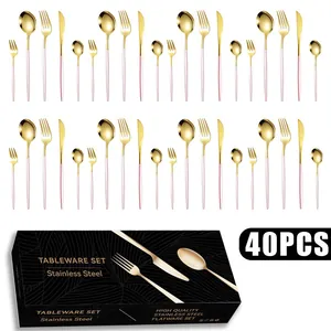 Detailed 40-piece stainless steel cutlery set in gold and pink with minimalist black box