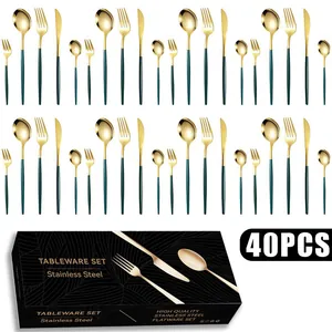 Detail of 40-piece gold and dark green stainless steel cutlery set with elegant gift box